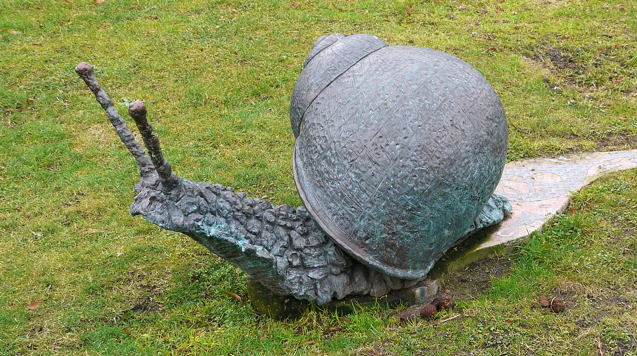 Bronzen kunstwerk Slak met muziekale slakkenspoor